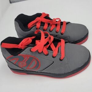 Youth size 5 red and gray Heelys like new worn twice, in excellent condition